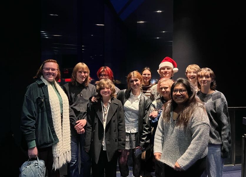 A group of youth and staff at the Guthrie Theater