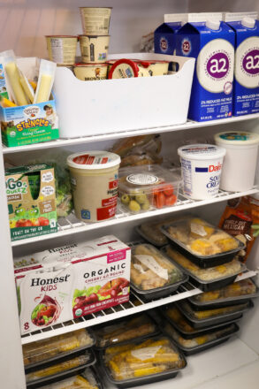 Food stacked in a fridge